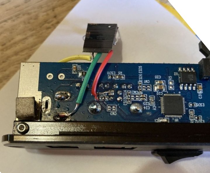 Back side of the SATA adapter with a soldered transistor acting as a low side switch